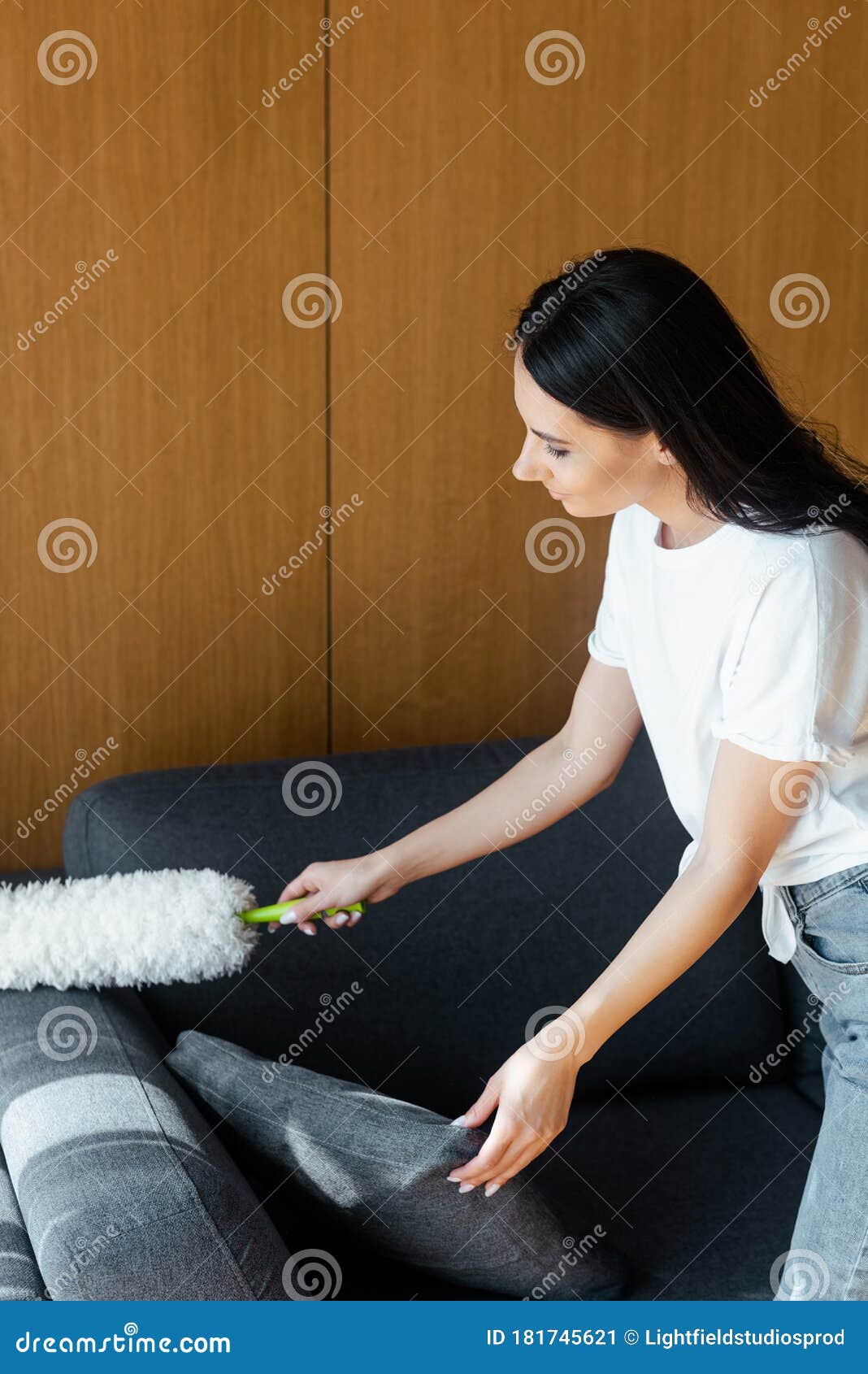 Woman Cleaning Dust from Sofa with Duster Stock Image Image of sofa