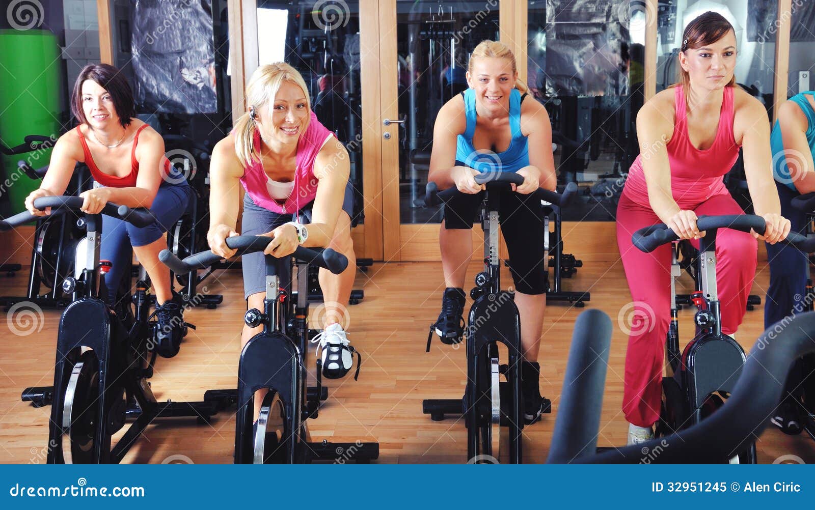 Beautiful Woman Doing Exercise in a Spinning Class Stock Image Image
