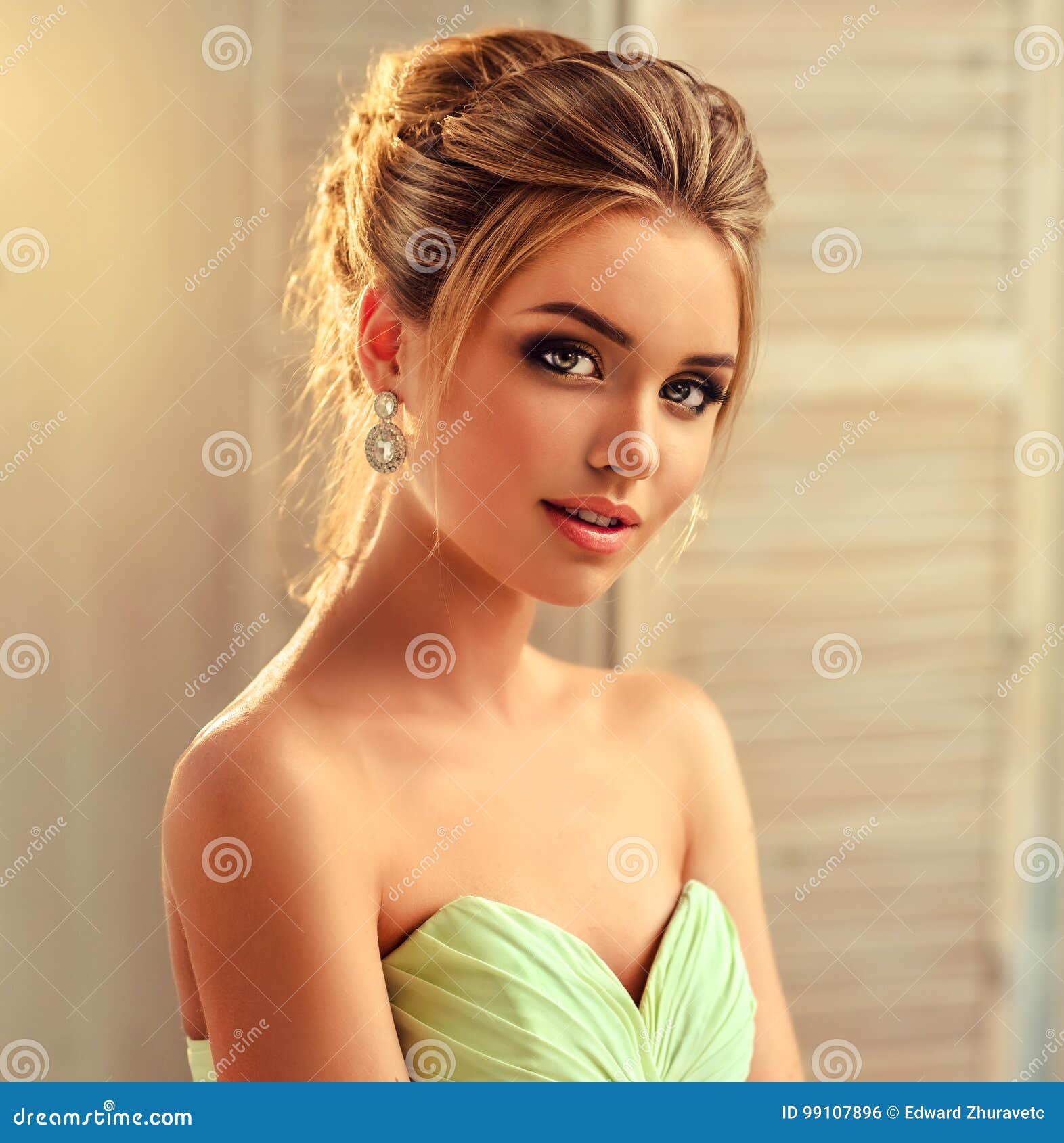 Young and Attractive Blond Model Dressed in Evening Gown and Jewelry  Earings. Stock Photo - Image of fashion, girl: 99107896