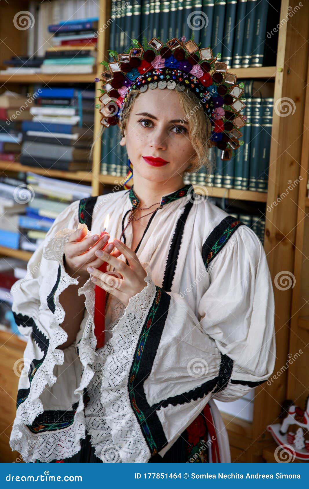 beautiful woman dressed in traditional romanian costume