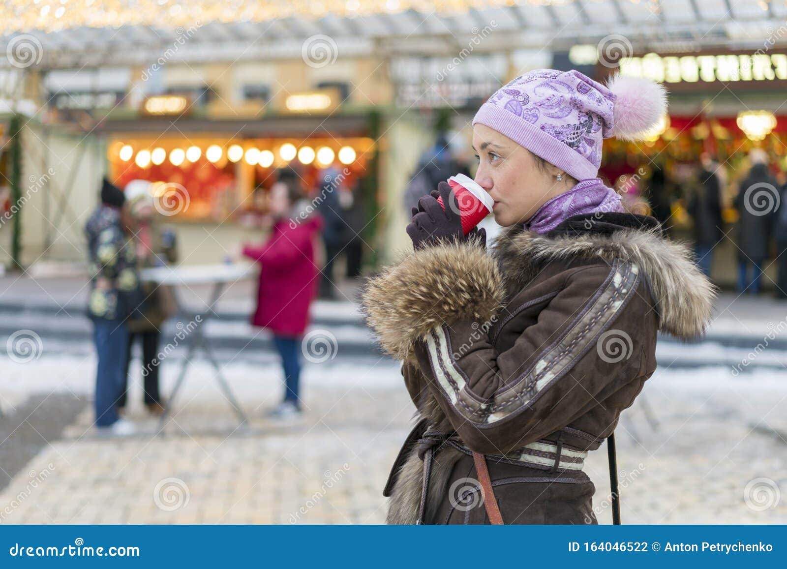 Beautiful Woman Drinking Coffee in the Street of Winter Clothes ...