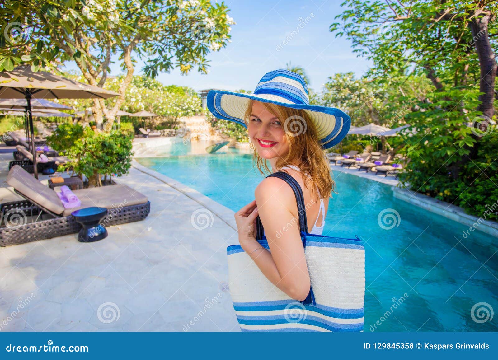 woman enjoying vacation in tropical getaway