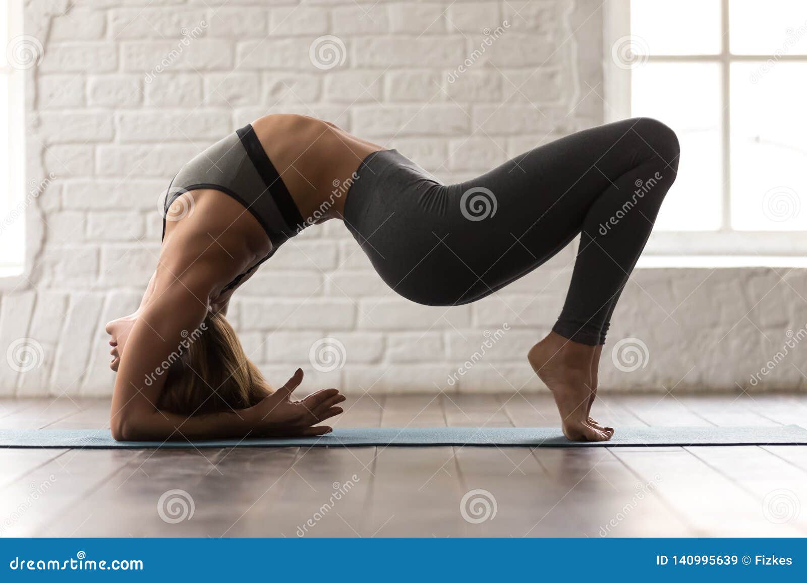 Beautiful Woman Practicing Yoga, Elbow Bridge Pose, Urdhva Dhanurasana