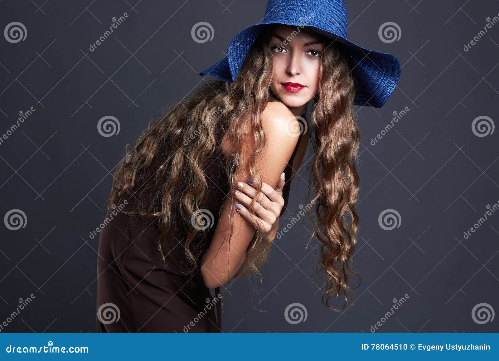  woman in hat. summer fashion beauty model girl with healthy hair