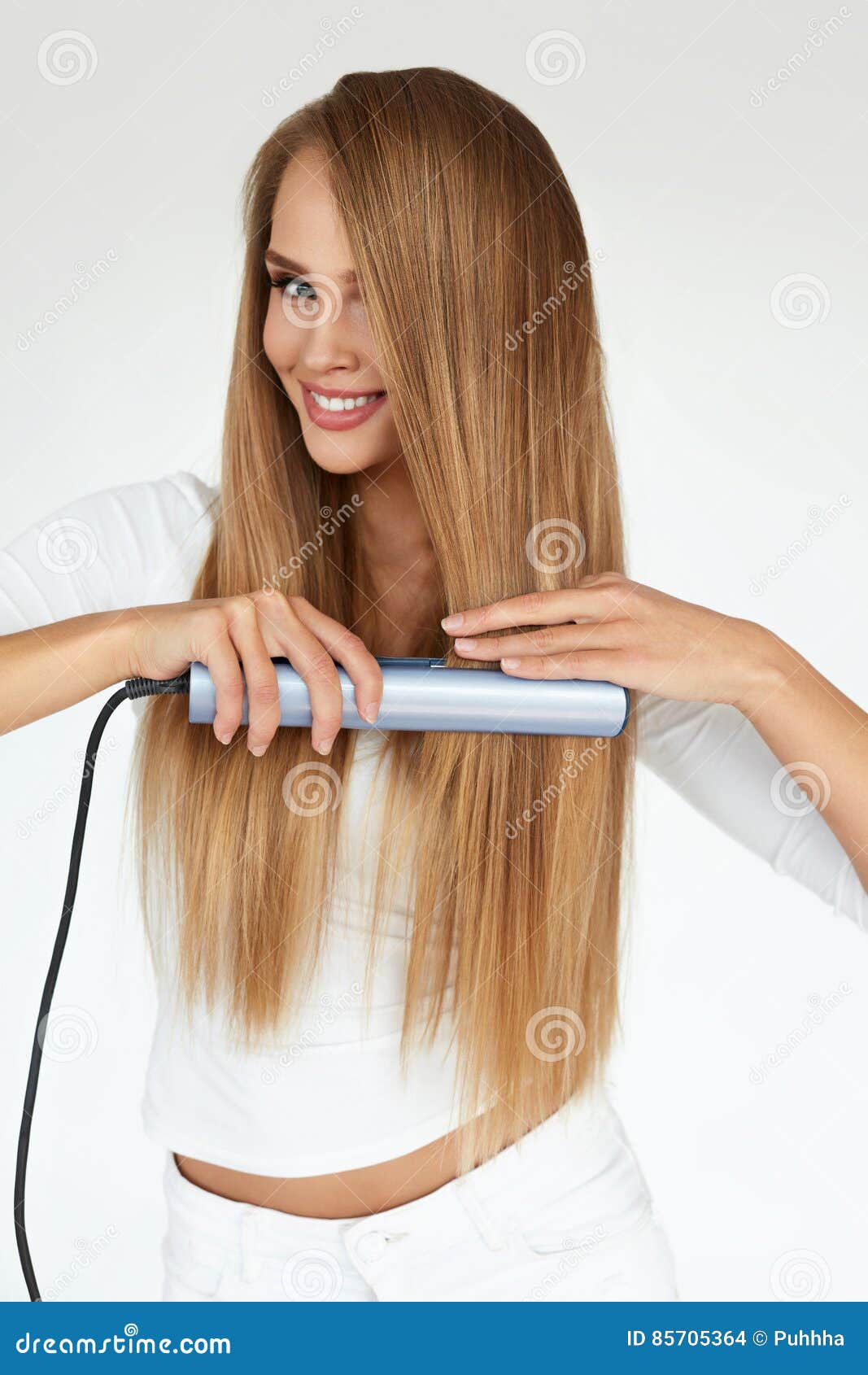 Beautiful Woman Ironing Long Straight Hair with Straightener Stock Photo -  Image of iron, indoors: 85705364
