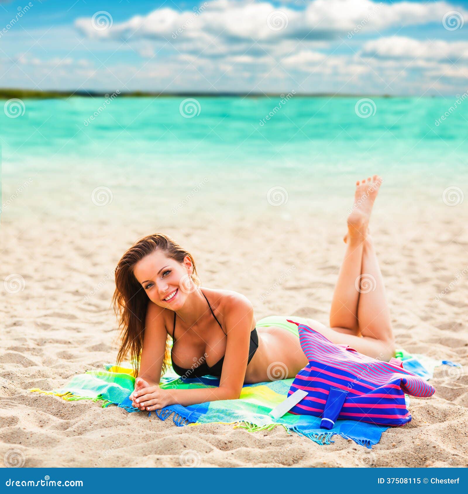 Beautiful Woman Laying on Beach Stock Image