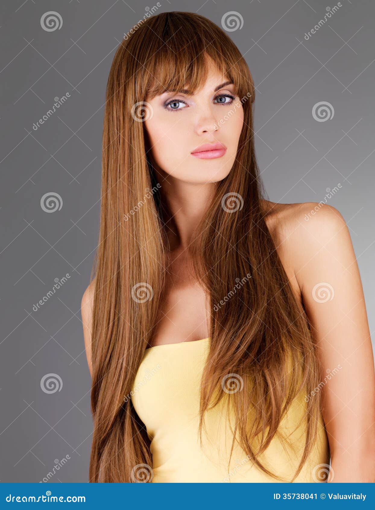 Face of a Beautiful Woman with Long Brown Curly Hair Fashion Model with  Wavy Hairstyle Attractive Young Girl with Curly Hair Stock Image  Image  of closeup blue 196126449