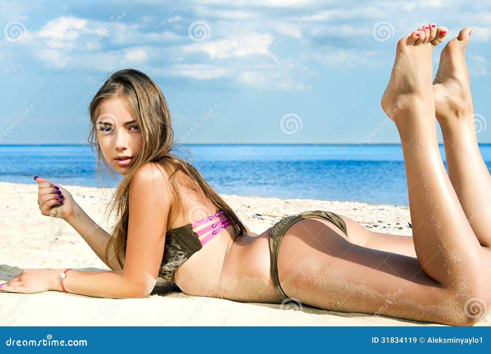 Lying beach woman on 