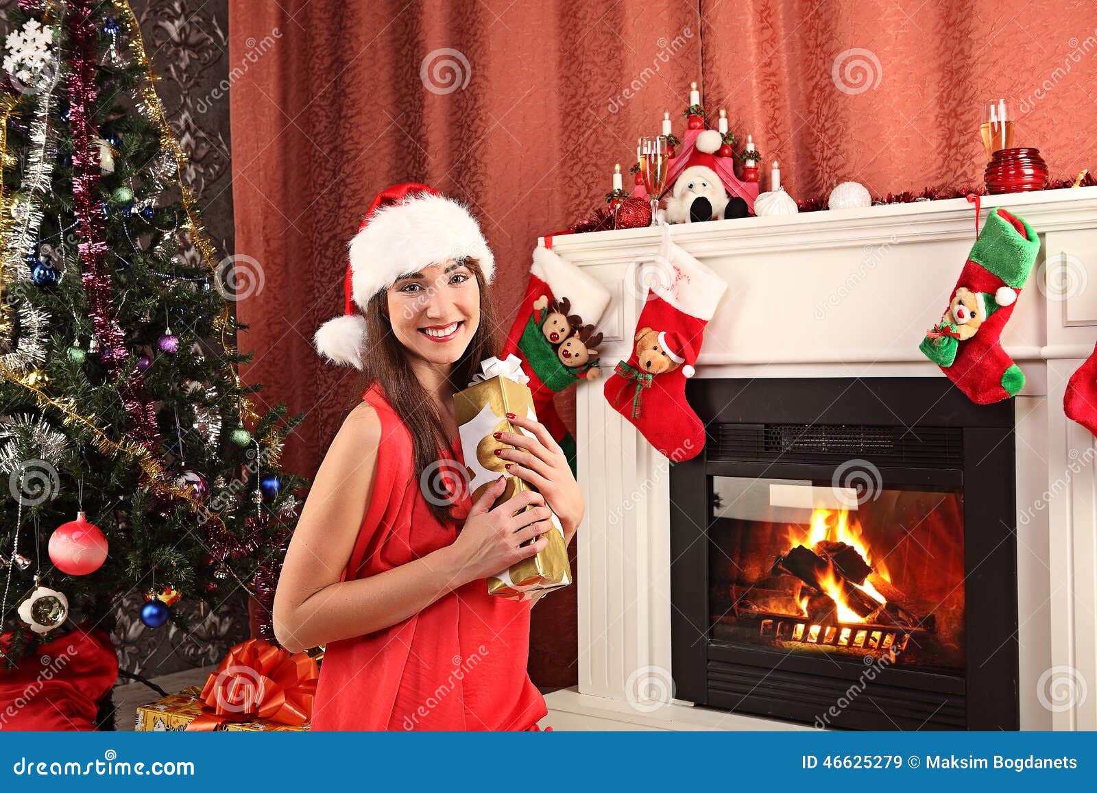Beautiful Woman Near the Fireplace in Winter House. Selebrating ...