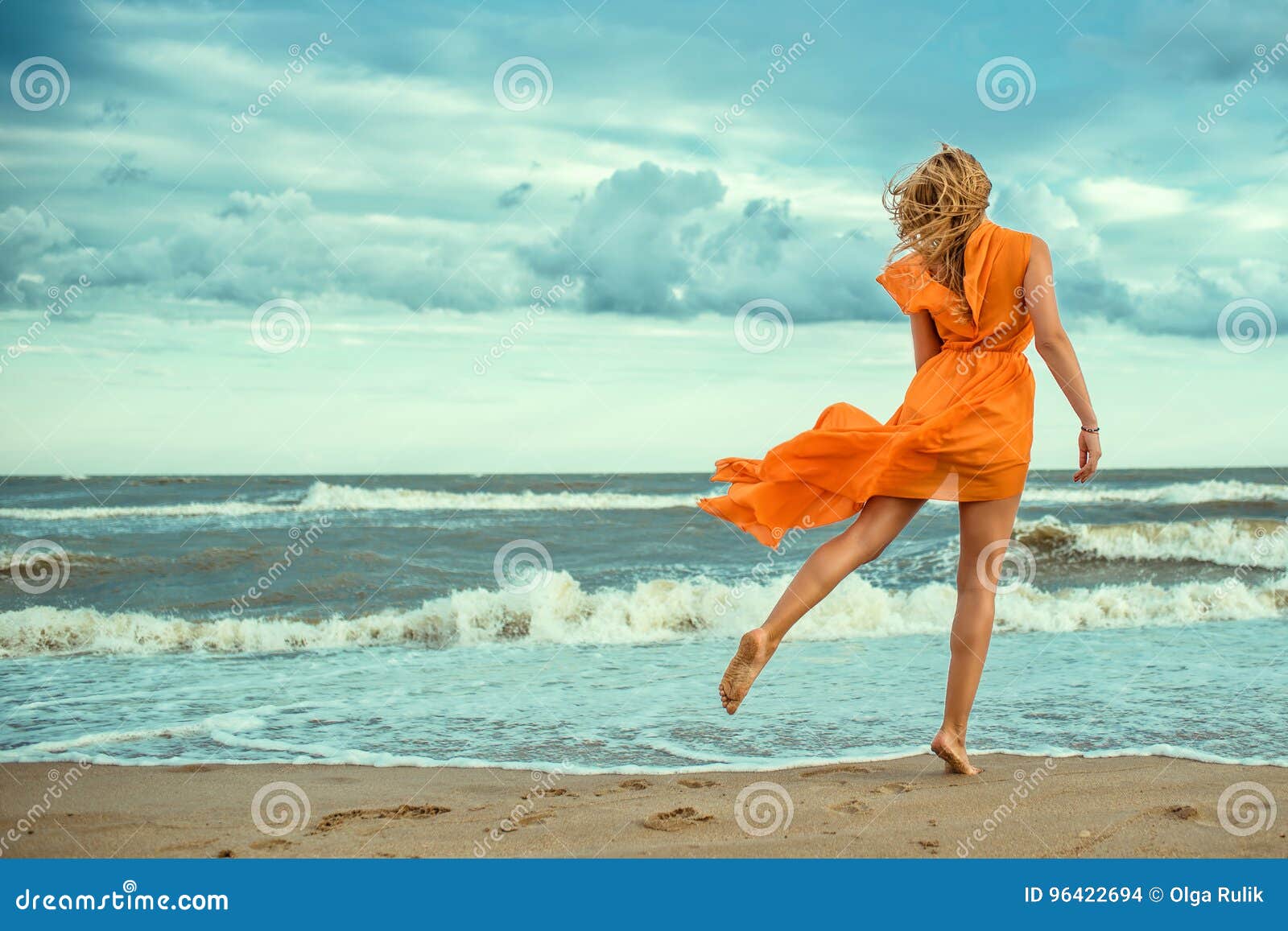 Woman in Orange Sports Wear Running · Free Stock Photo