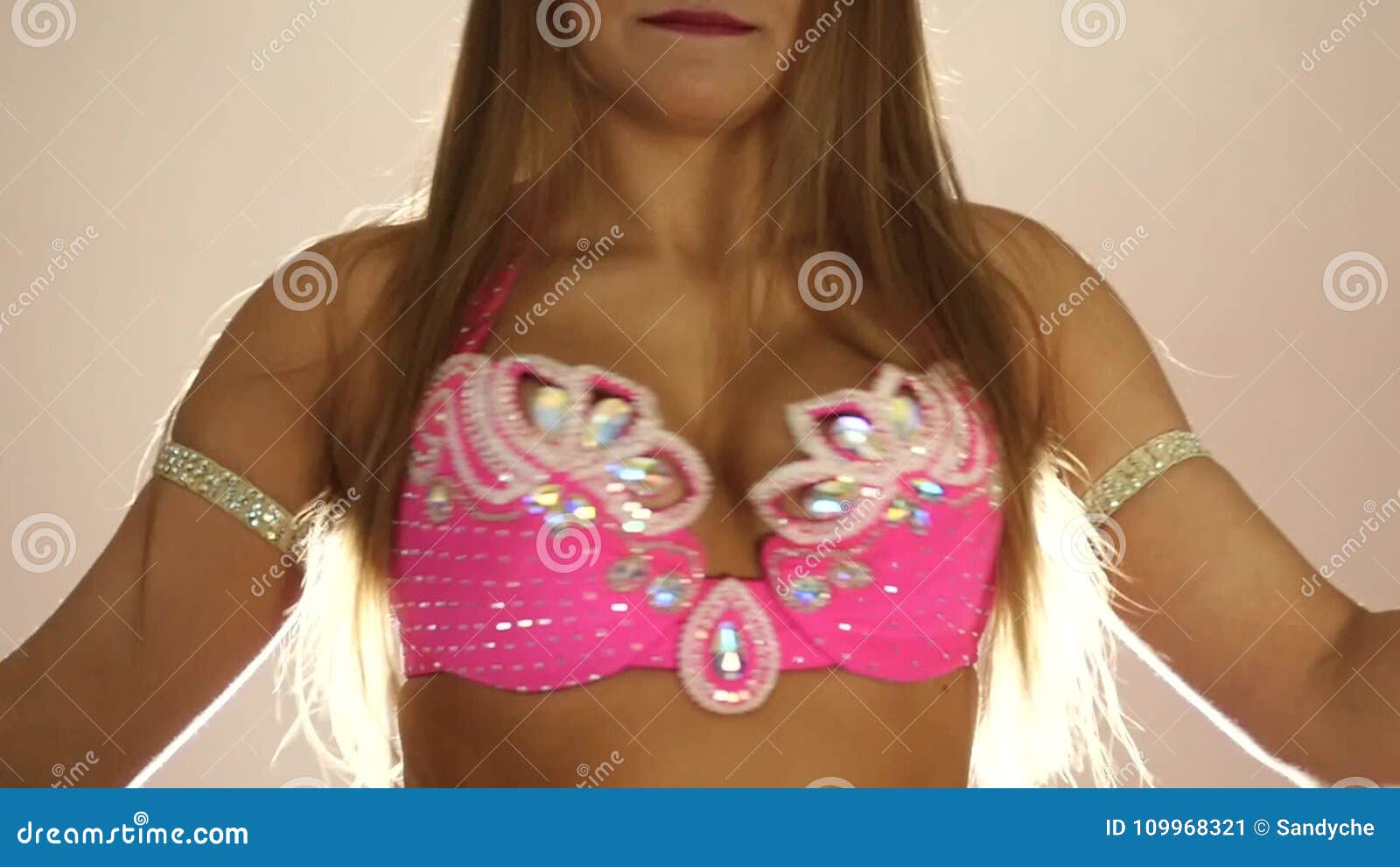 beautiful woman in oriental bra with large breasts shaking body slow  motion. Oriental dance Stock Video