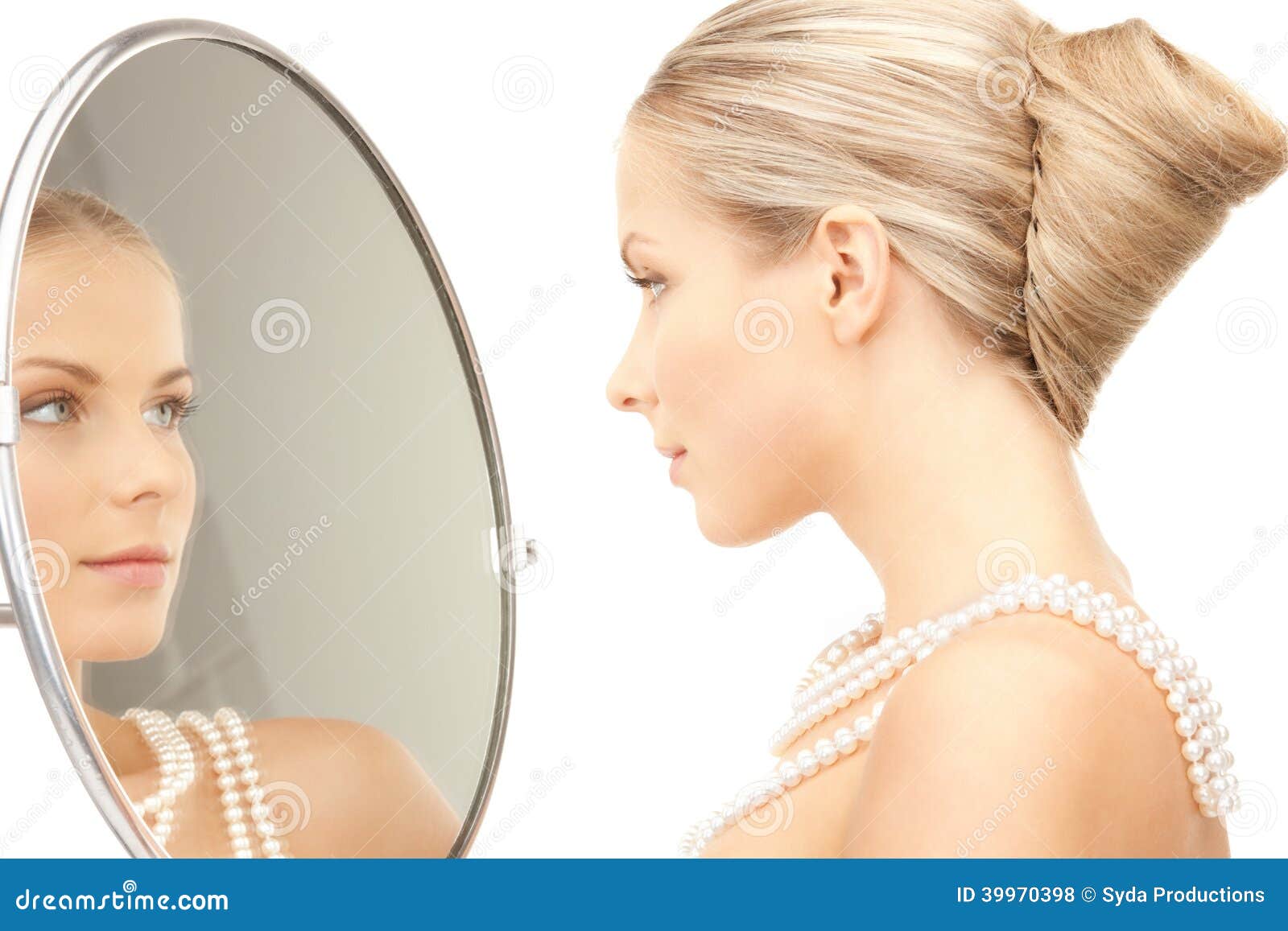 Picture of beautiful woman with pearl beads and mirror.