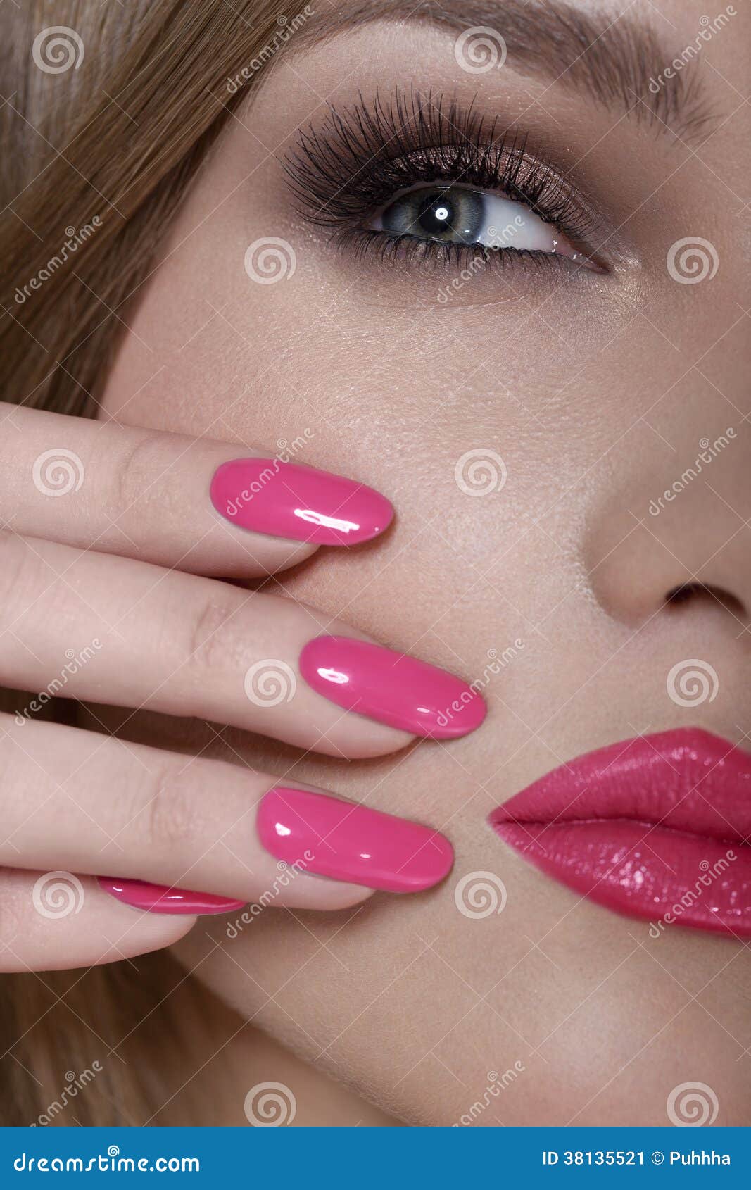 Beautiful Woman With Pink Nails And Luxury Makeup. Red Lips And Long