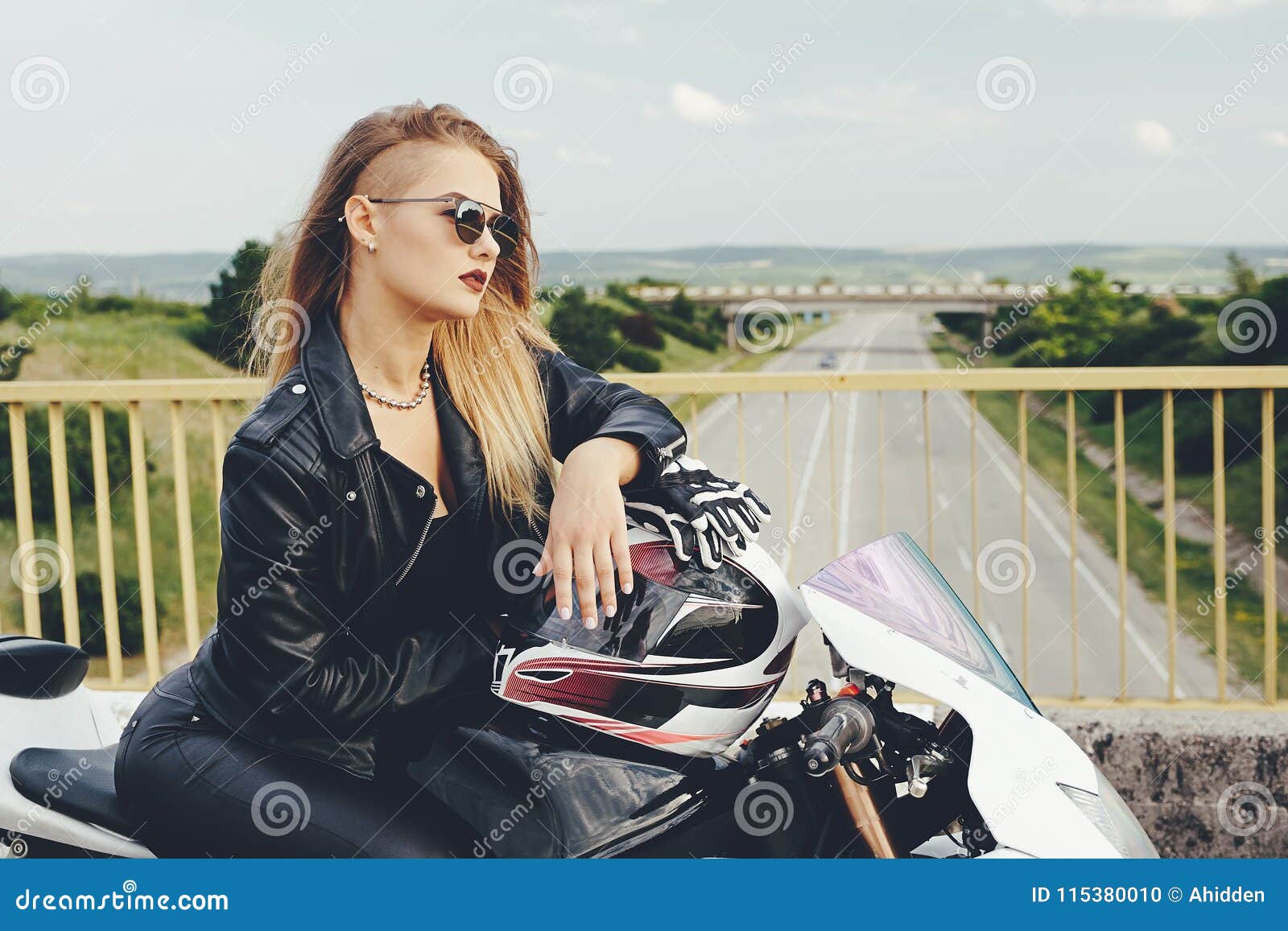 Beautiful Woman Posing with Sunglasses on a Motorbike Stock Photo ...