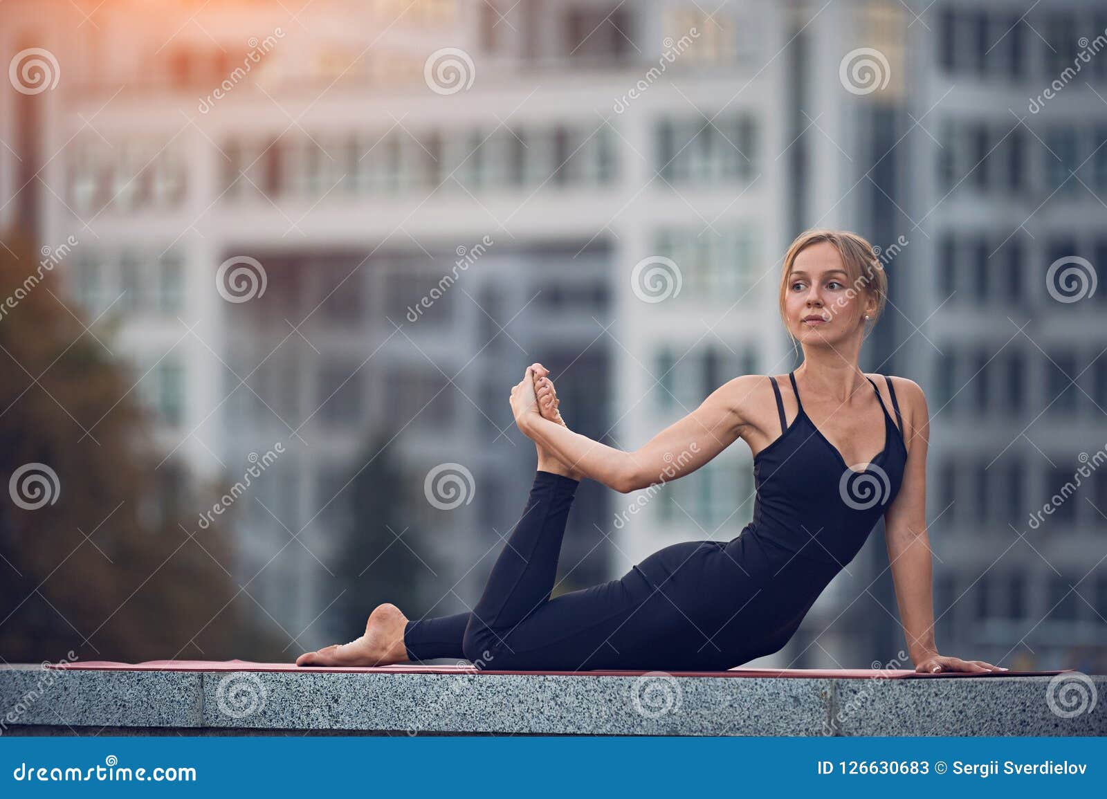 Half bow pose Cut Out Stock Images & Pictures - Alamy