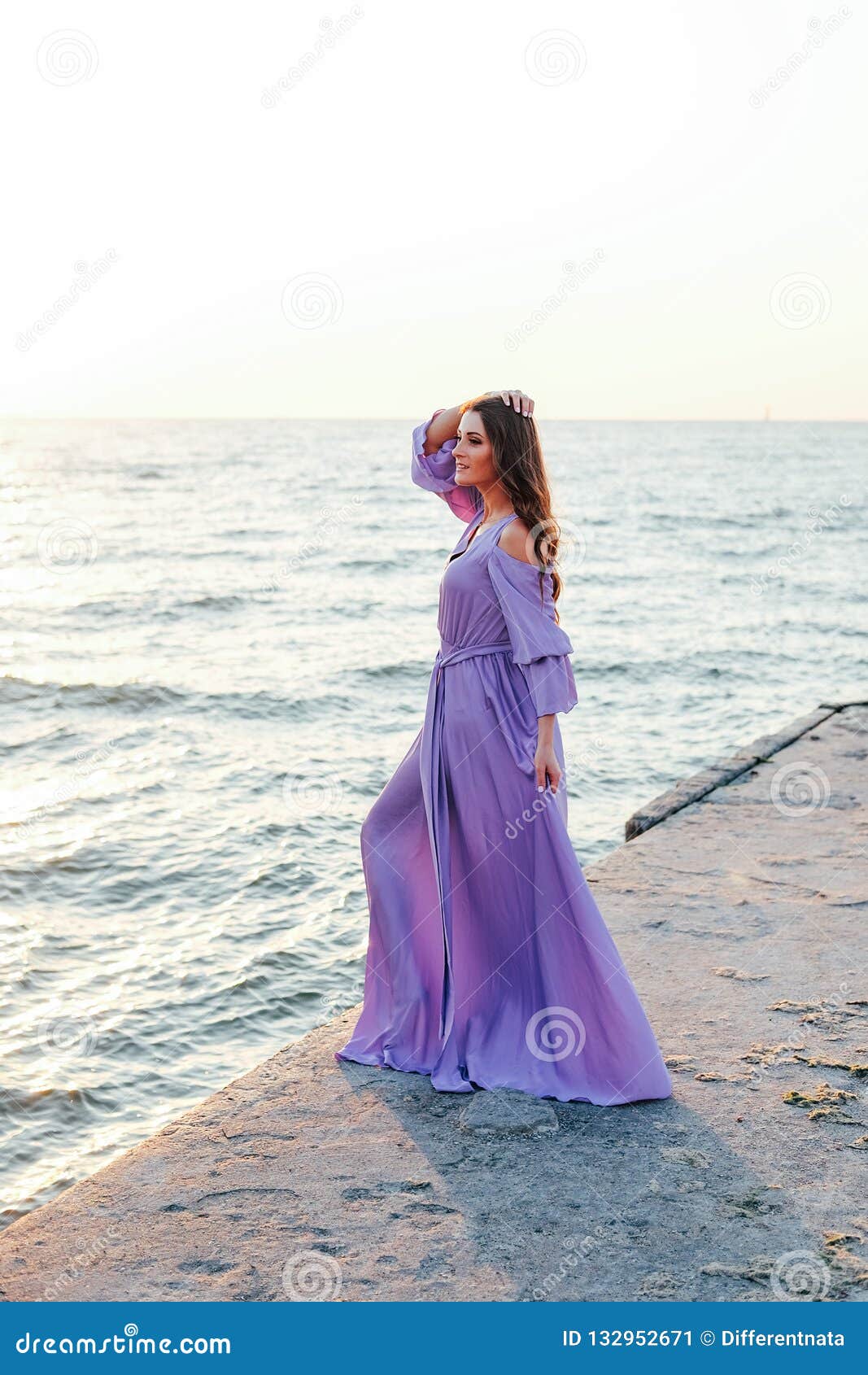Beautiful Woman in Purple Flowing Dress ...
