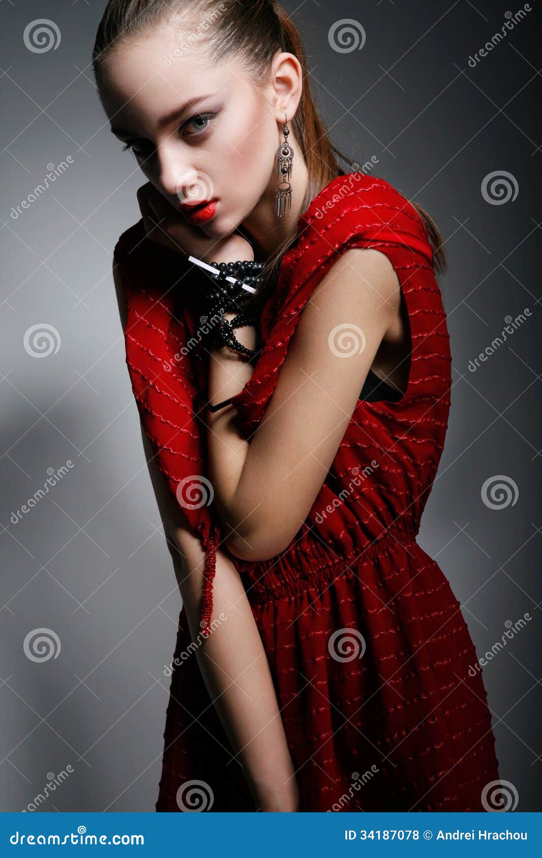 Beautiful Woman In Red Dress Looking At Camera Stock Photo 