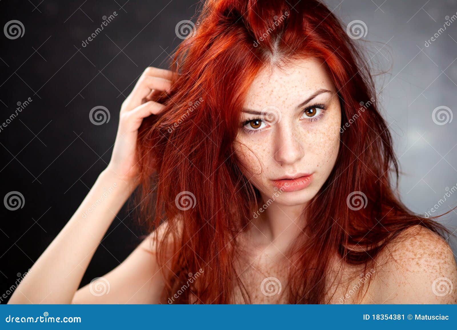 beautiful woman with red hair and freckles