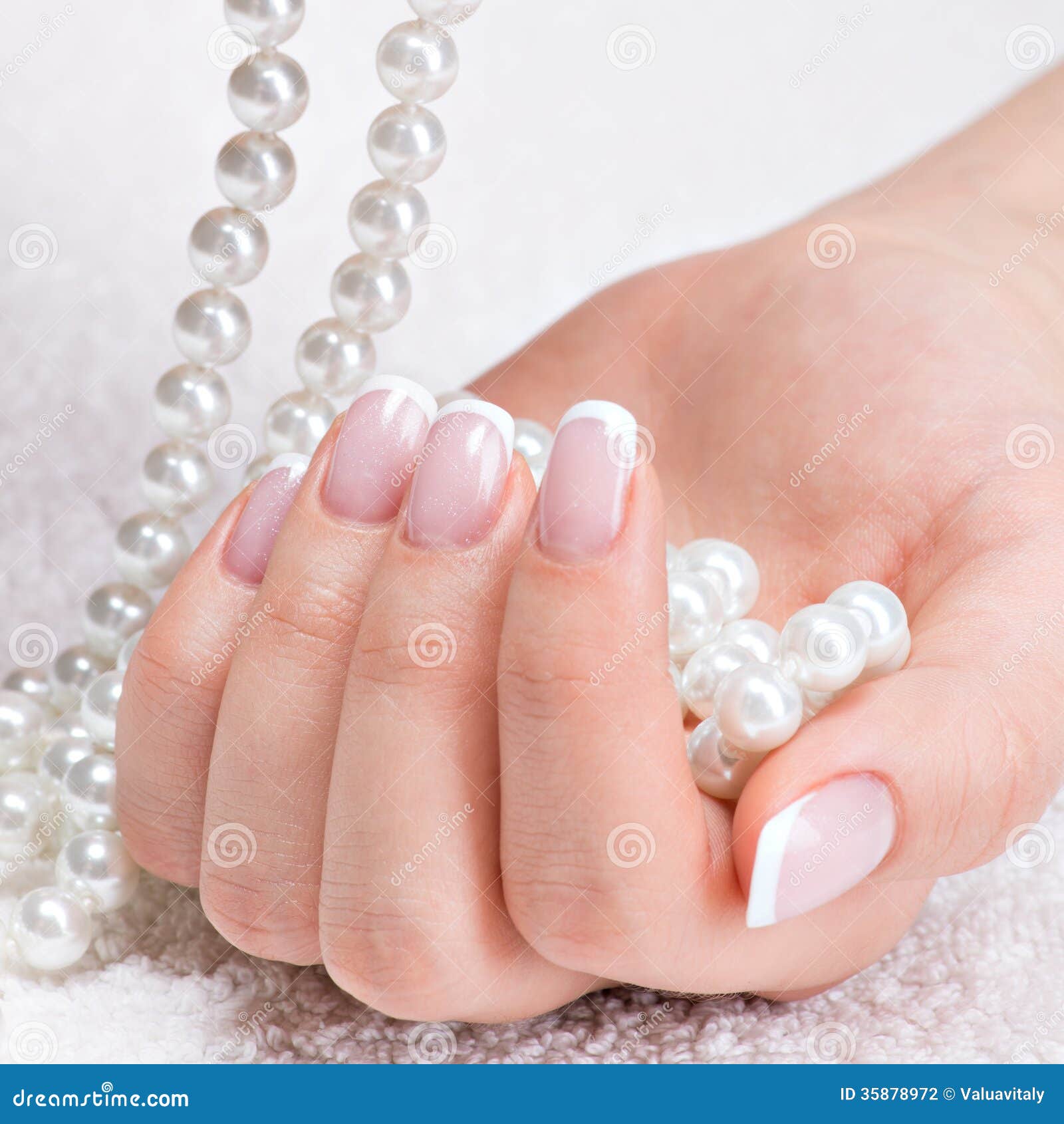 Beautiful Woman S Nails with French Manicure and Pearls Stock Photo ...