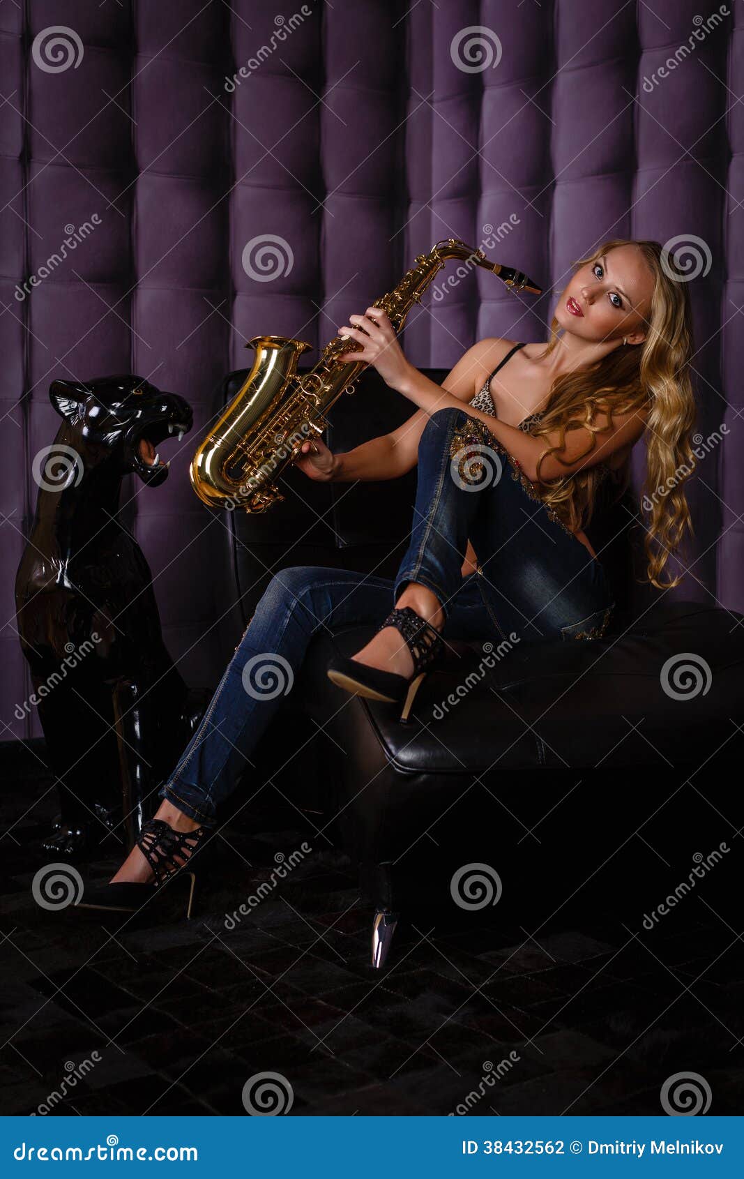 Beautiful Woman with Saxophone. Stock Photo Image of girl, holding