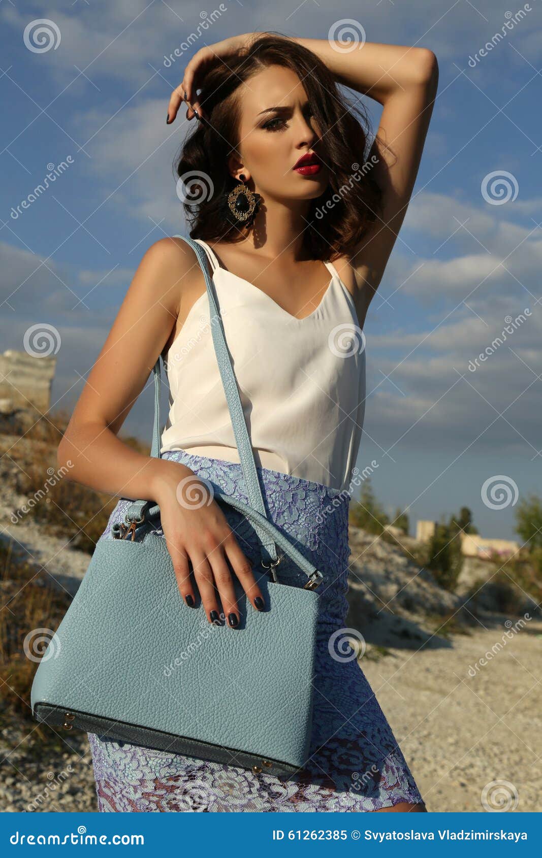 Beautiful Woman With Short Dark Hair Wears Elegant Dress 