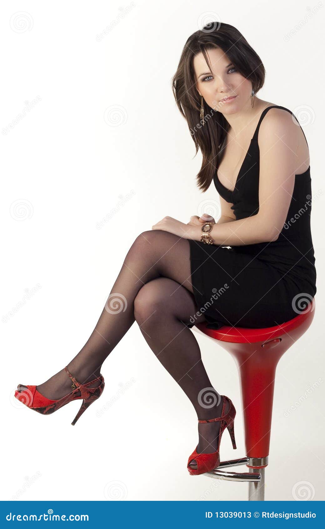 Beautiful Woman Sitting In Chair Stock Photos - Image: 13039013