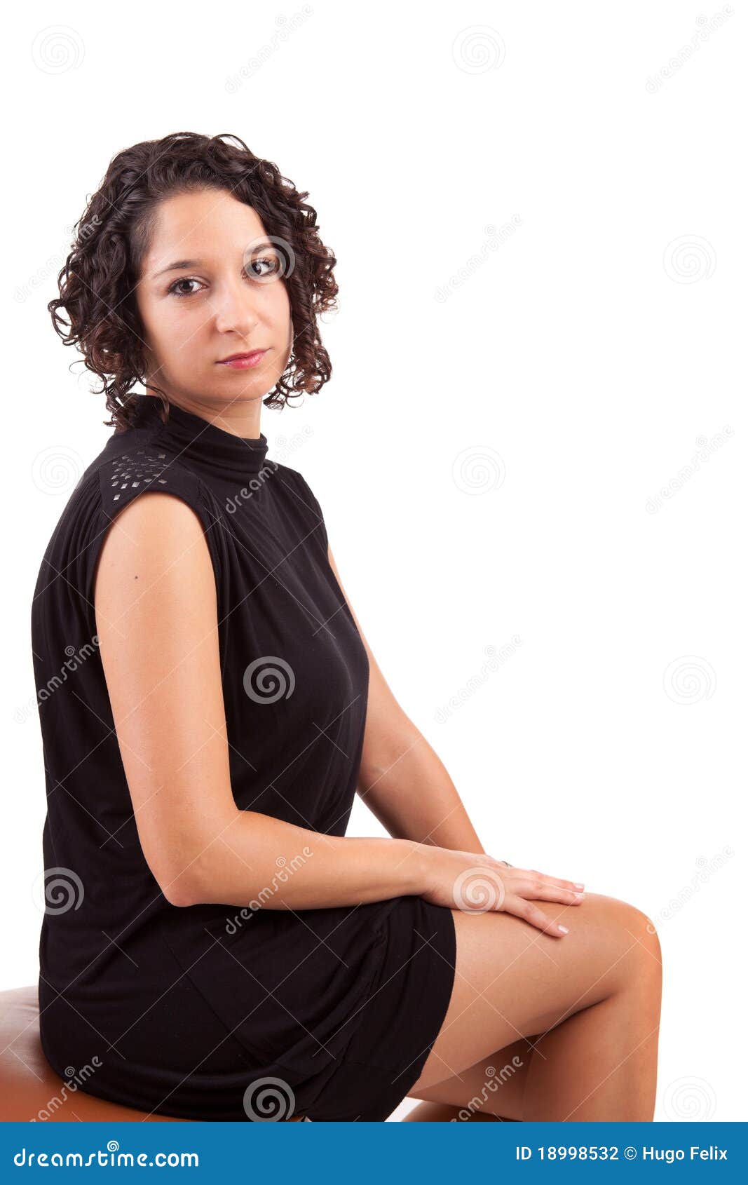 Beautiful Woman Sitting On A Chair Stock Photography 