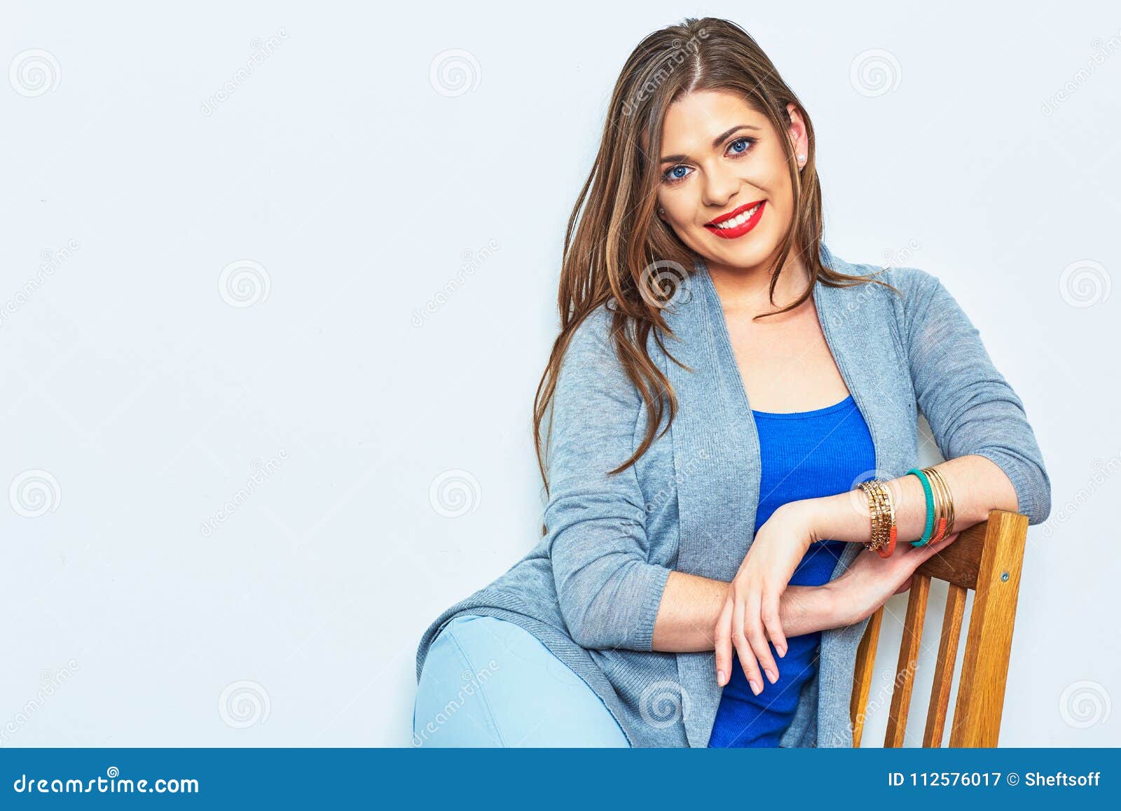 Beautiful Woman Sitting on Chair.Studio Portrait Stock Image - Image of ...