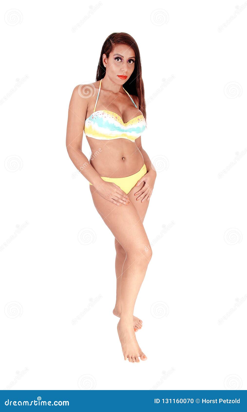 https://thumbs.dreamstime.com/z/beautiful-woman-standing-bikini-front-gorgeous-young-slim-yellow-her-hands-legs-big-breasts-isolated-131160070.jpg