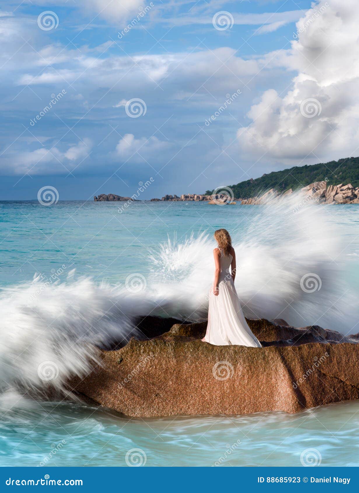 Beautiful Woman Stands On Rock Splashing Sea Waves White Dress Stock