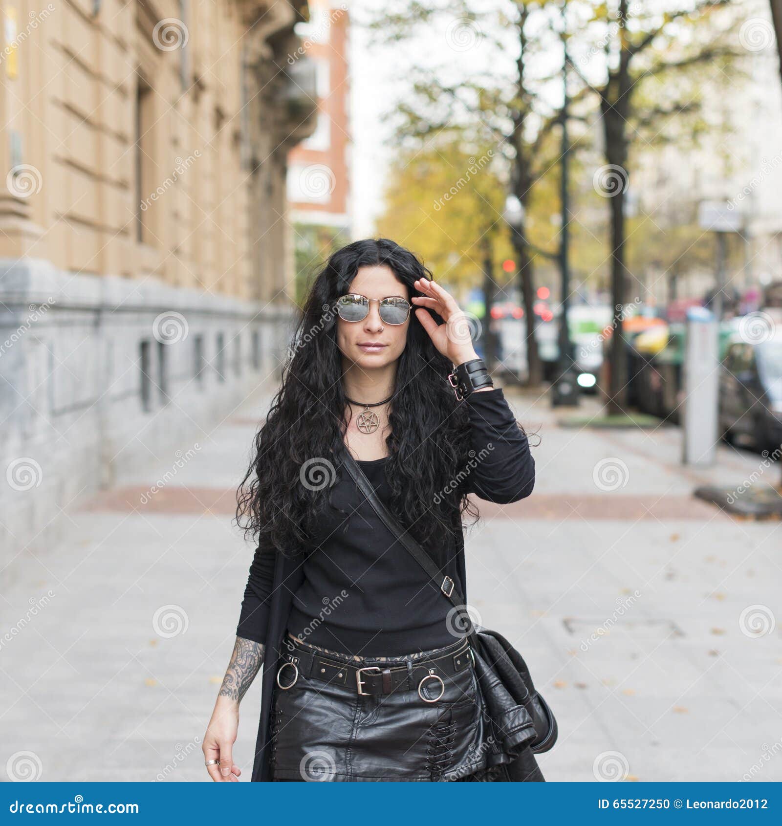 Beautiful Woman with Sunglasses Heavy Metal Style Walking. Stock Photo -  Image of attractive, tattoo: 65527250