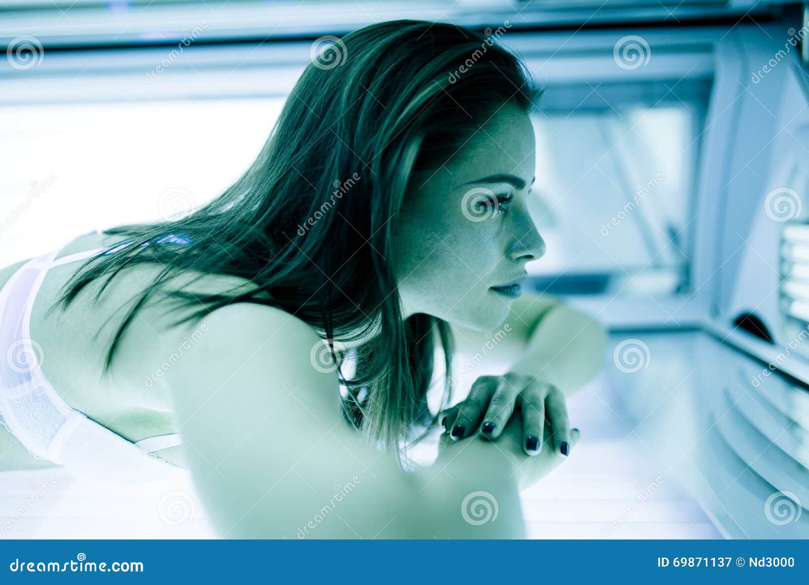 Young sexy girl sunbathing in the solarium in her underwear lying on the  bed. Generative AI 24032418 Stock Photo at Vecteezy