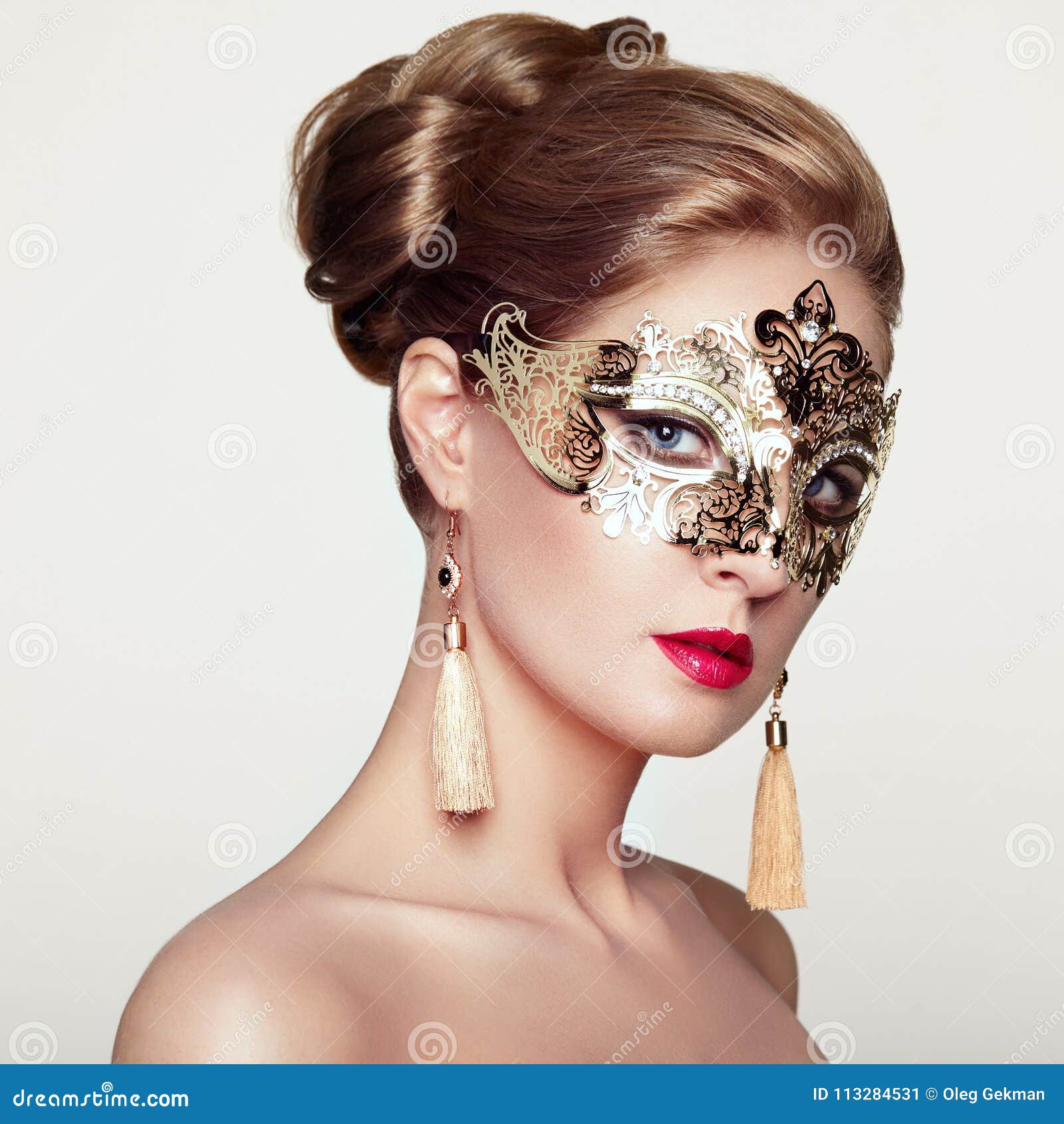 beautiful woman in venetian masquerade mask stock image