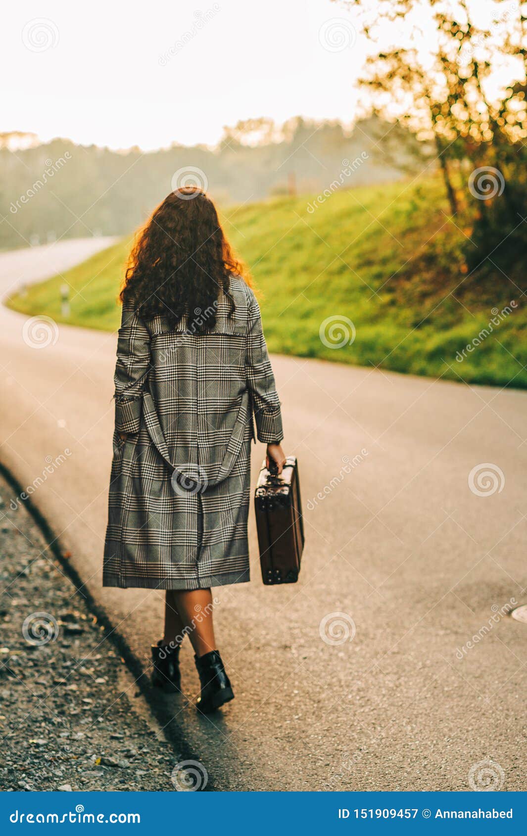 Beautiful Woman Walking Away Down the Road Stock Image - Image of