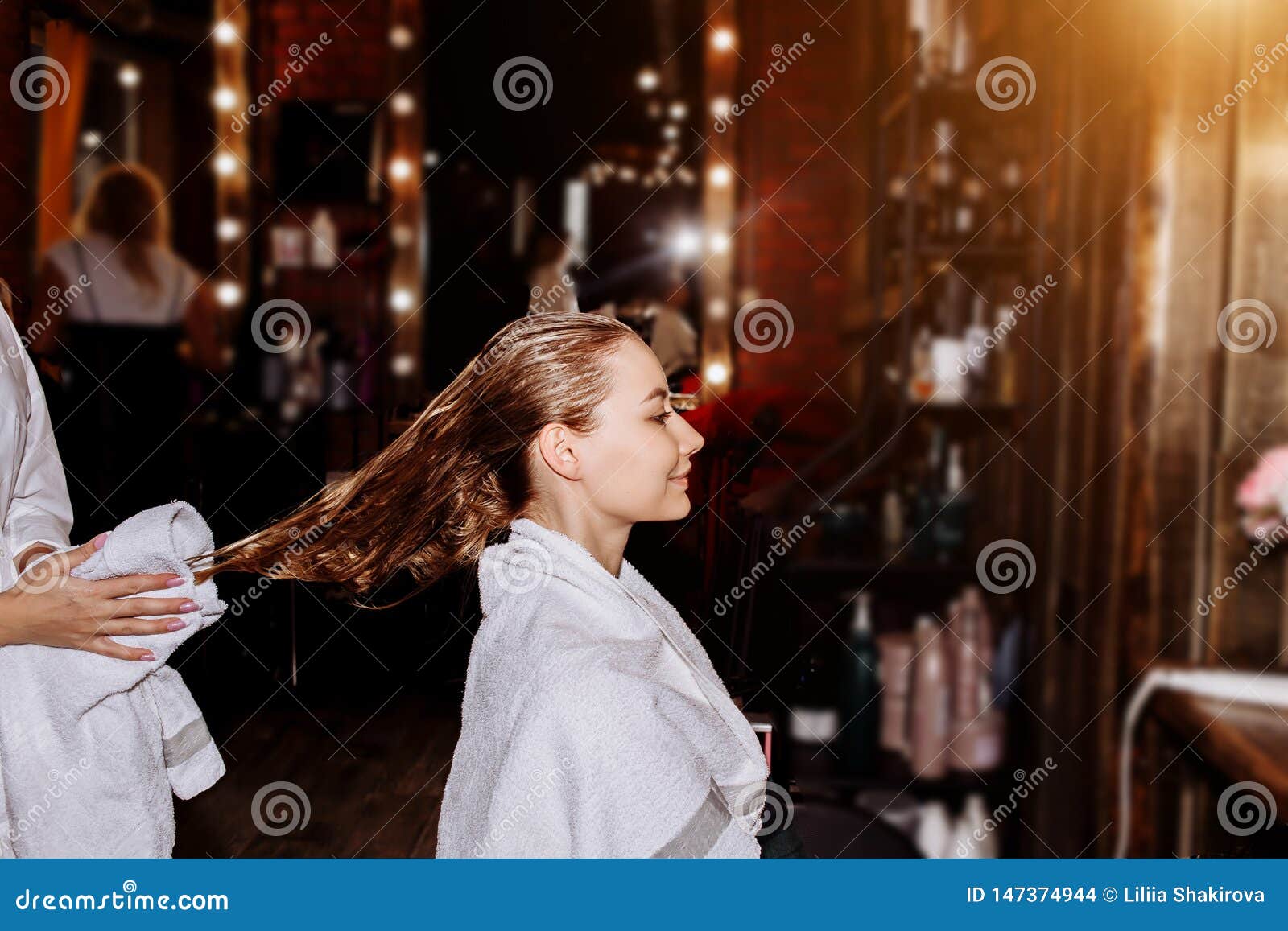 Beautiful Woman Washing Hair in a Hair Salon Stock Photo - Image of  massage, blond: 147374944