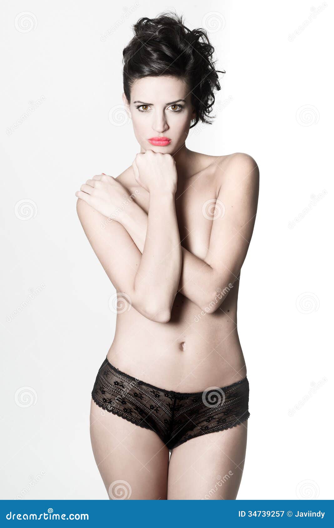 Beautiful Woman Wearing only Black Panties on White Background