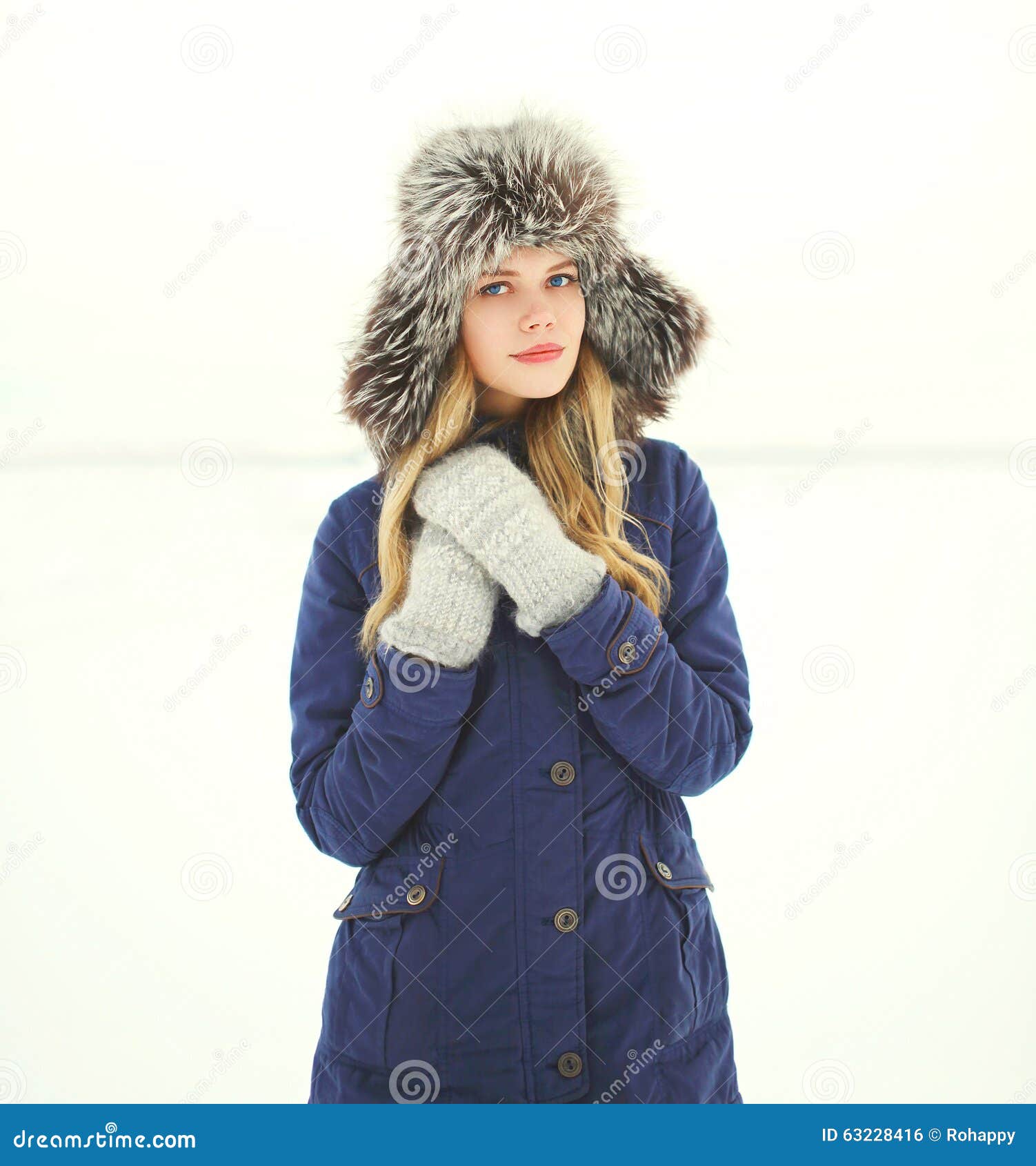 Beautiful Woman Wearing a Coat Jacket and Hat Over Snow in Winter Stock ...