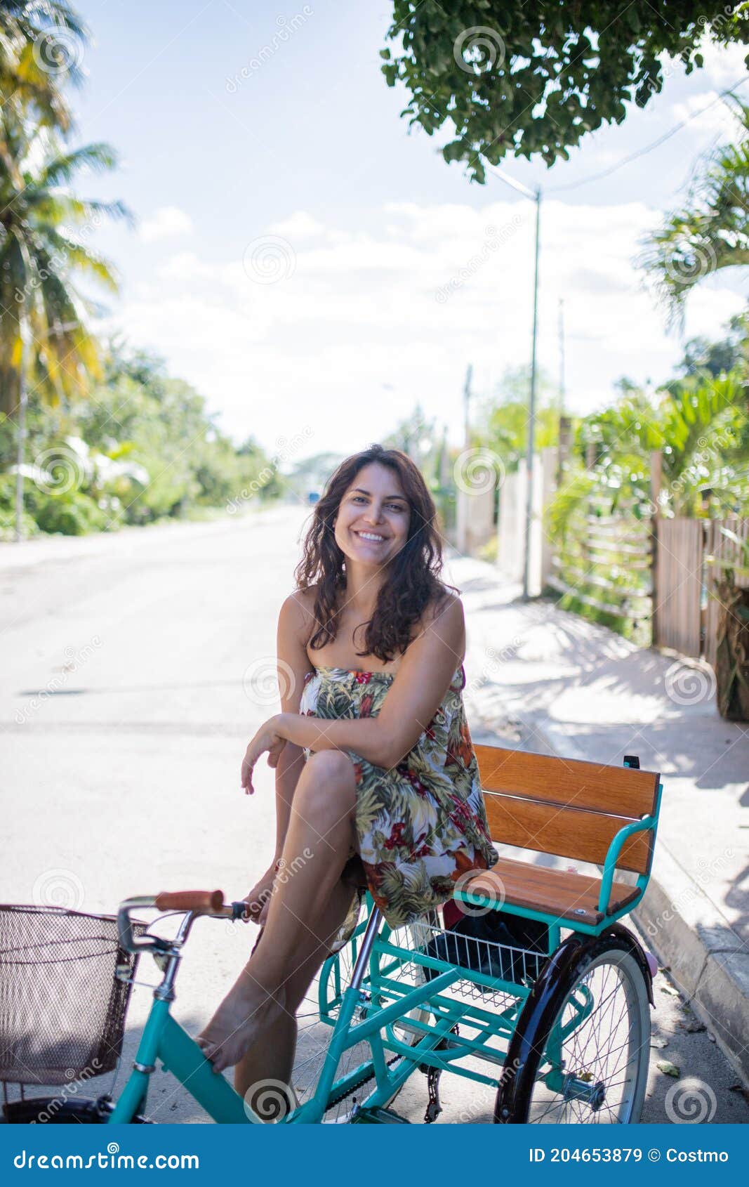 https://thumbs.dreamstime.com/z/beautiful-woman-wearing-dress-riding-adult-tricycle-beautiful-smiling-woman-wearing-flowered-dress-riding-adult-204653879.jpg