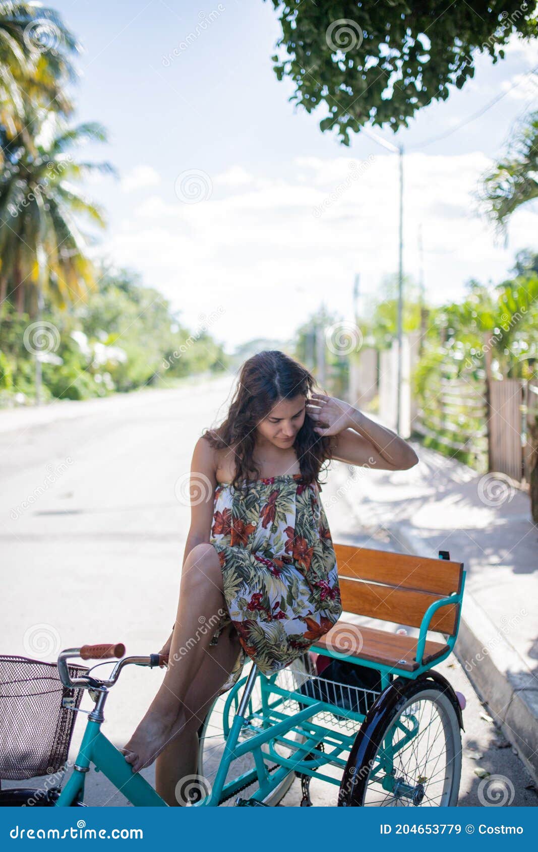 https://thumbs.dreamstime.com/z/beautiful-woman-wearing-dress-riding-adult-tricycle-beautiful-woman-wearing-flowered-dress-riding-adult-tricycle-204653779.jpg