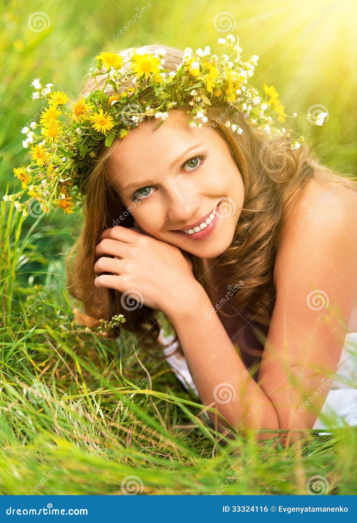 Beautiful Woman in Wreath of Flowers Lies in the Green Grass Out Stock ...