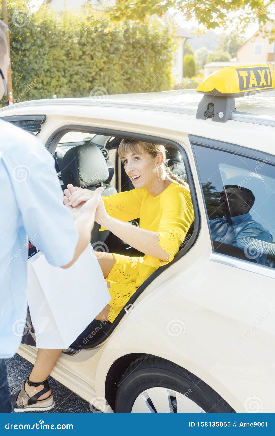 Woman Getting Out Of Taxi And The Driver Helping Her Stock Image Image Of Auto Driver 158135065