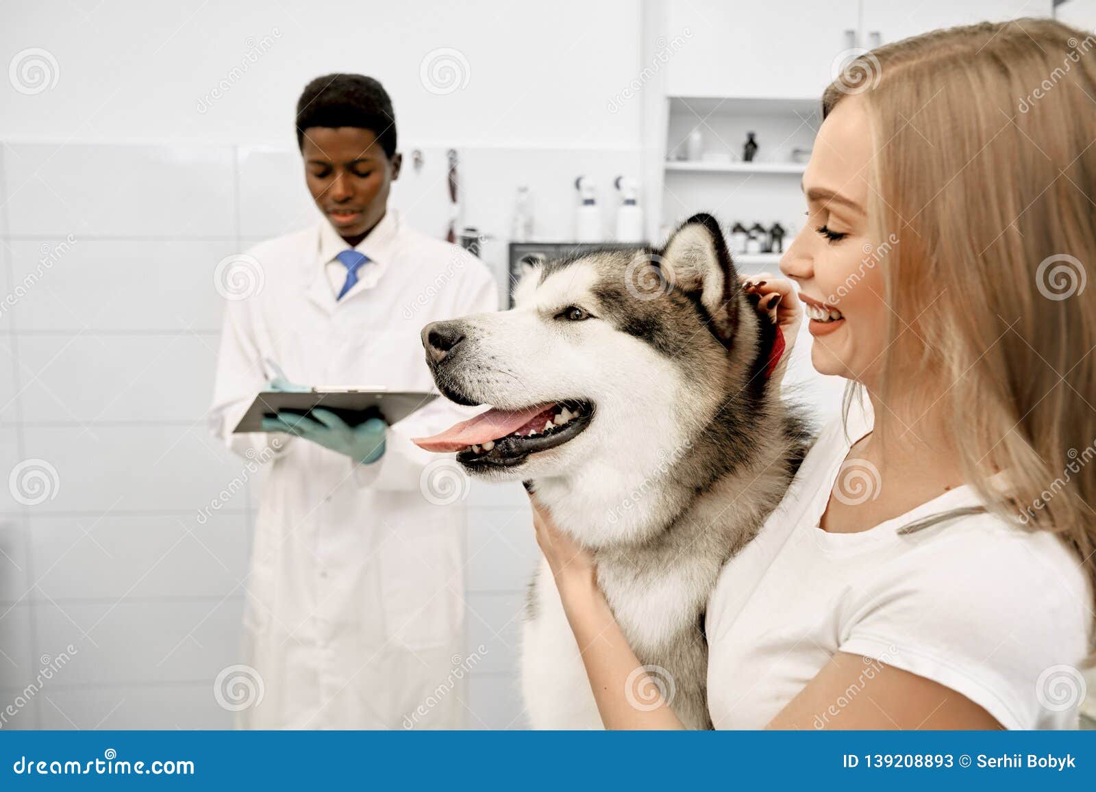 Beautiful Women with Her Dog in Vet Clinic. Stock Image - Image of caucasian, animal: 139208893 Beautiful Women with Her Dog in Vet Clinic. Stock Image - Image of caucasian, animal: 139208893