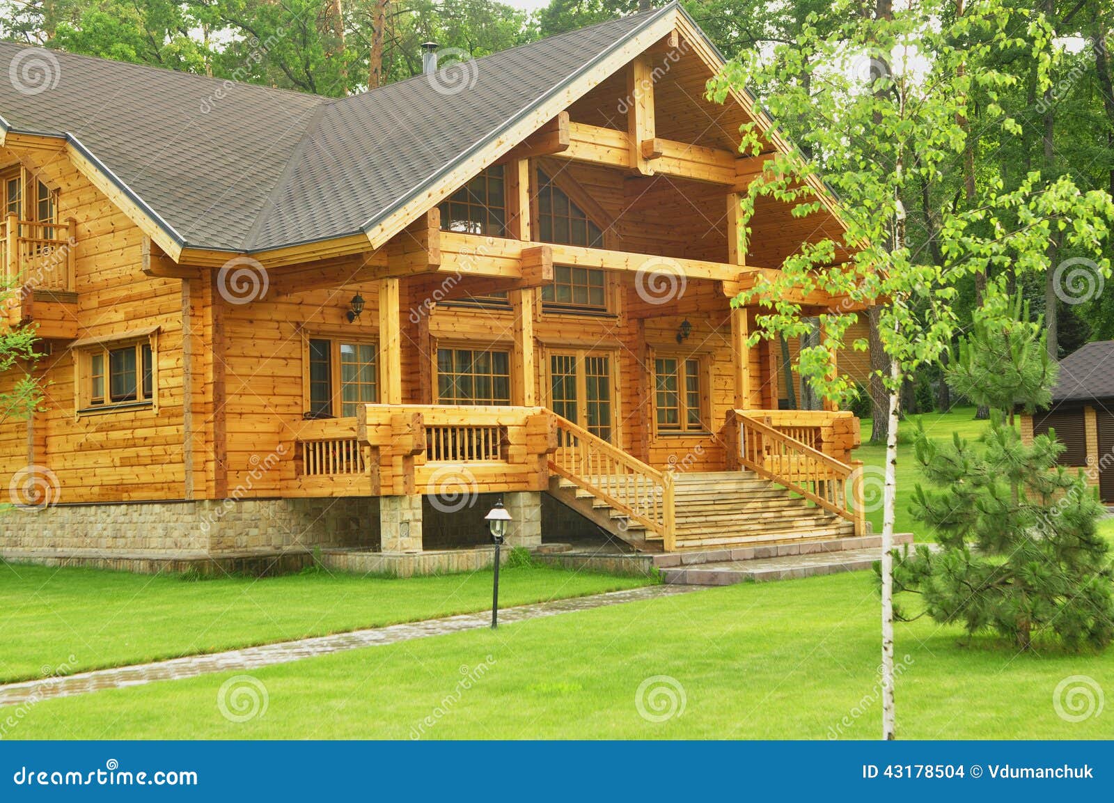 Beautiful Wooden House In The Forest Stock Photo - Image 