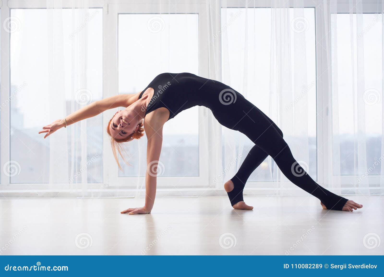 Beautiful Sporty Fit Yogini Woman Practices Yoga Asana Camatkarasana - Wild  Thing Pose in the Yoga Studio. Stock Image - Image of bright, person:  110082289