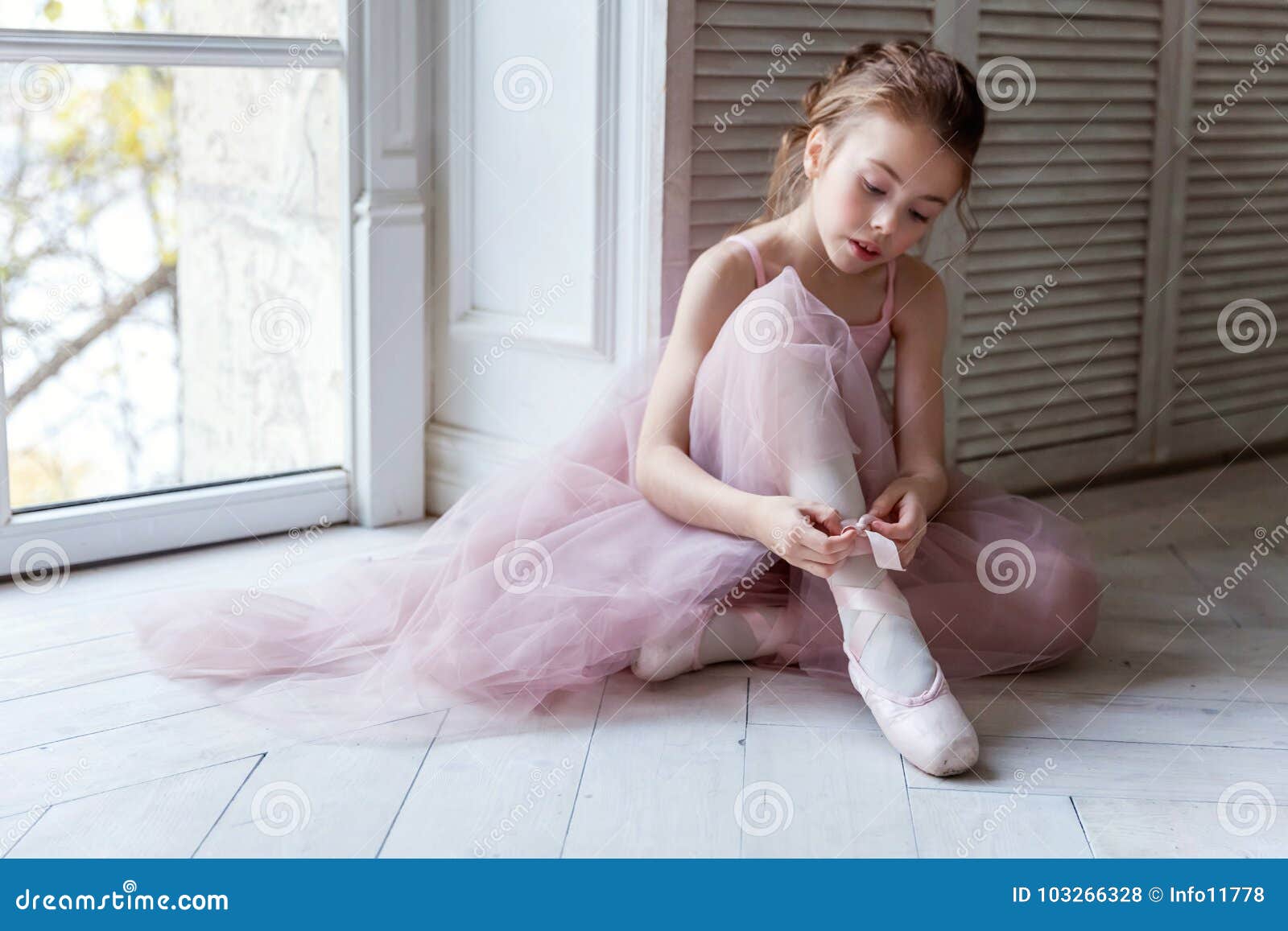 Ballerina Puts Pointe Shoes Stock Photo - Image of girl, elements ...