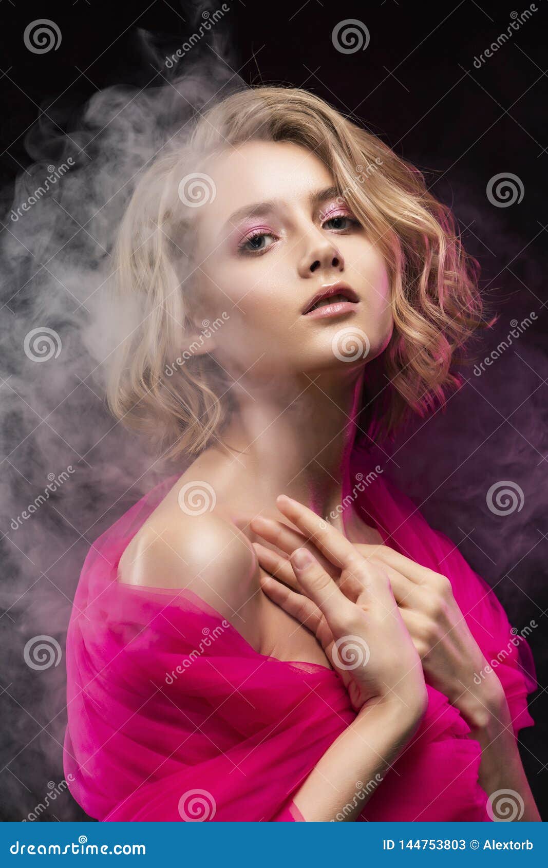 Beautiful Young Blonde Girl With Naked Oily Shoulders And Curly Hair Wrapped In A Pink Veil Posing On A Pink Gradient Background Stock Image Image Of Makeup Fashion