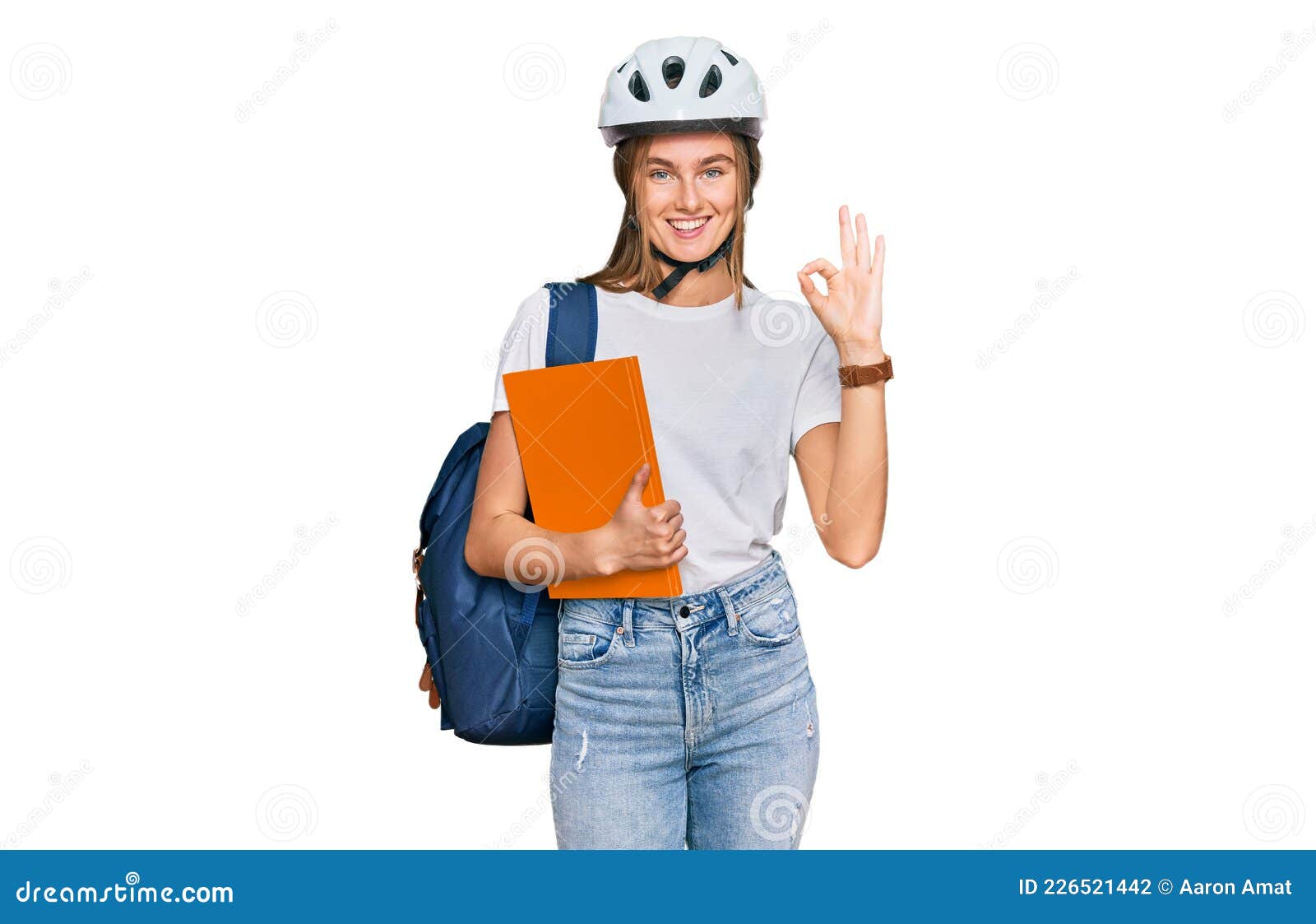 Beautiful Young Blonde Woman Wearing Backpack And Bike Helmet Doing Ok Sign With Fingers 