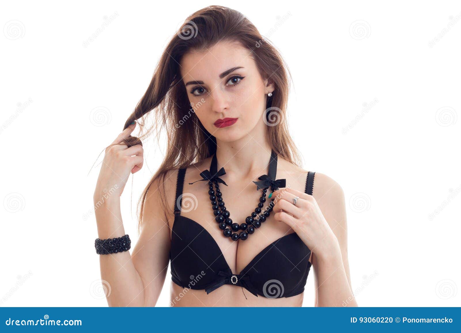 https://thumbs.dreamstime.com/z/beautiful-young-brunette-red-lipstick-big-breasts-black-bra-beads-around-her-neck-looks-his-camera-93060220.jpg