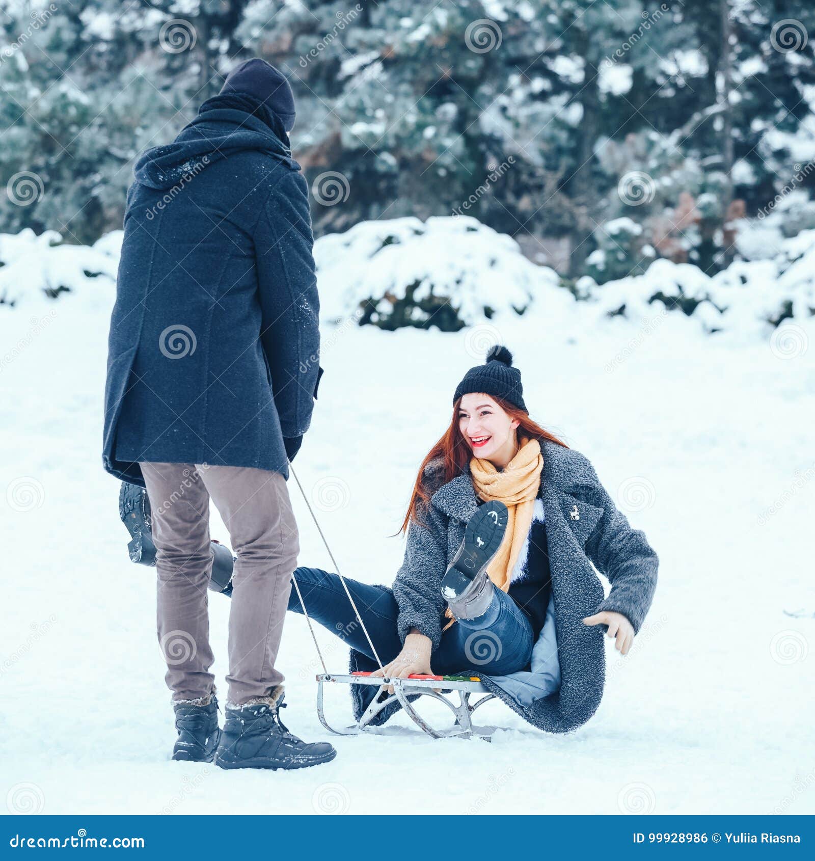 Young Couple In Love Enjoying A Winter Vacation And Having