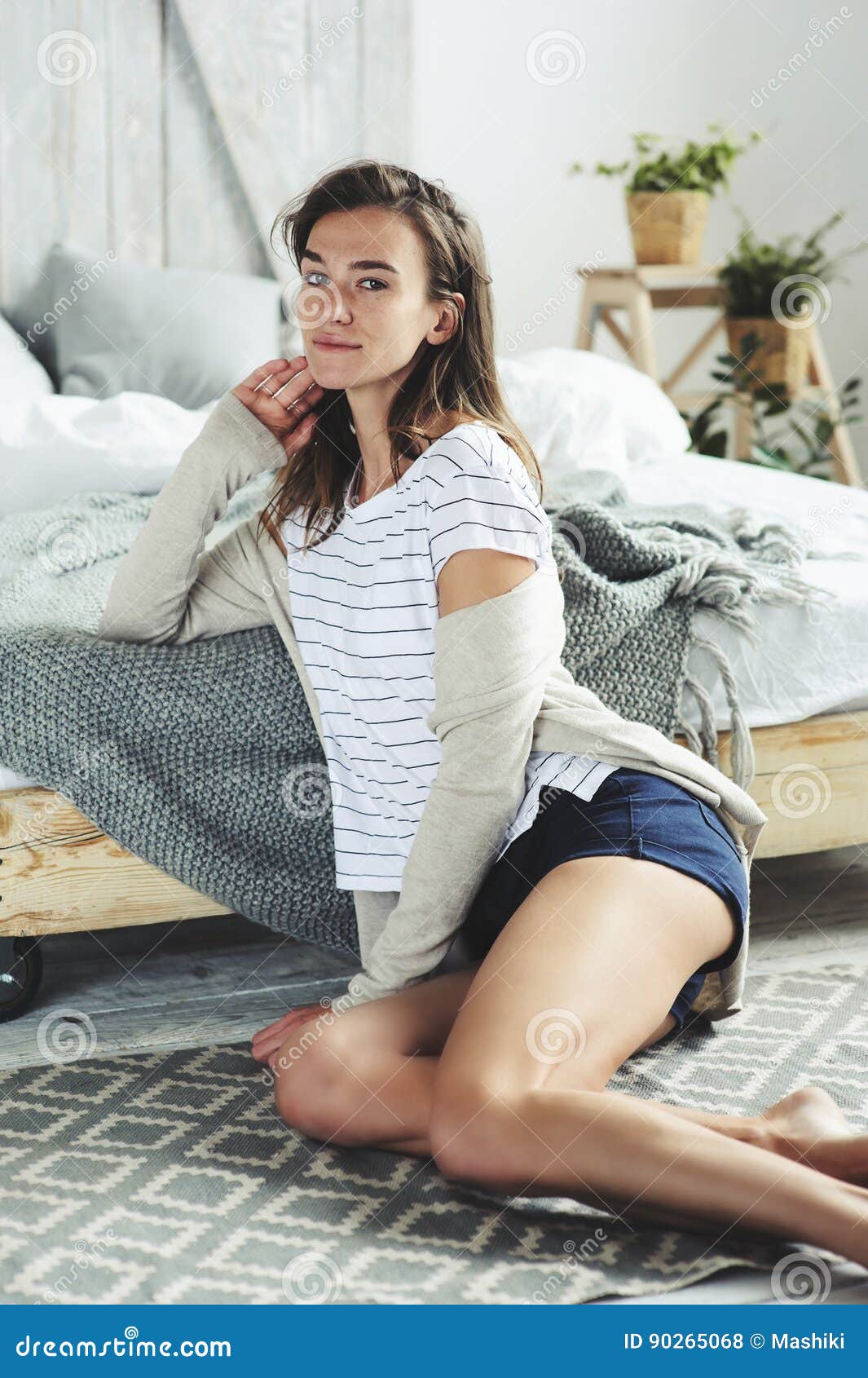 Beautiful Young Feminine Woman Relaxing in Bedroom in Lazy Weekend ...